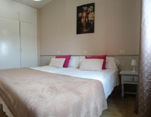 Postel nebo postele na pokoji v ubytování CASA PORTELA APARTAMENTOS