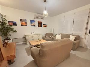 Ein Sitzbereich in der Unterkunft Apartmani Merica