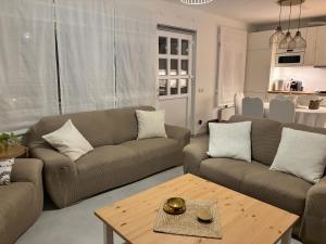 Ein Sitzbereich in der Unterkunft Apartmani Merica