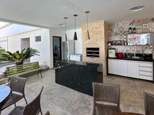 Kuchyň nebo kuchyňský kout v ubytování Olho D'água Oasis