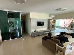 TV a/nebo společenská místnost v ubytování Olho D'água Oasis