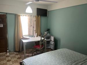 Postel nebo postele na pokoji v ubytování Bruks Guest House