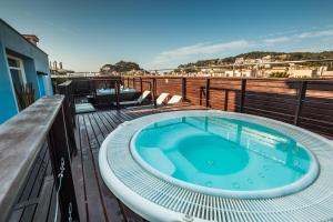 
a large swimming pool with a boat in the water at Florida in Tossa de Mar
