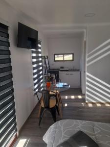 Μια τηλεόραση ή/και κέντρο ψυχαγωγίας στο Cabaña en sector santa Julia, curacautin