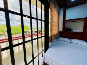 Postel nebo postele na pokoji v ubytování Aparta Hotel Horinthia