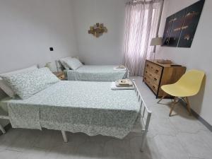 Postel nebo postele na pokoji v ubytování Civico 89 affittacamere