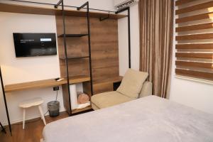 Postel nebo postele na pokoji v ubytování Villa Flower Berat