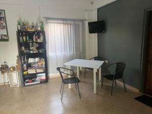 TV a/nebo společenská místnost v ubytování Bruks Guest House