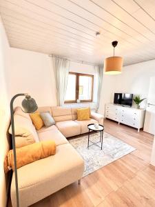 Χώρος καθιστικού στο Ferienwohnung in Lorsch mit Garten
