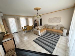 Posezení v ubytování Aqua Azur Apartman