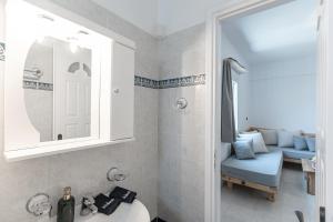 Koupelna v ubytování Paraga Suites + 37 fotografií