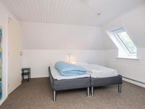 Postel nebo postele na pokoji v ubytování Holiday home Højer III