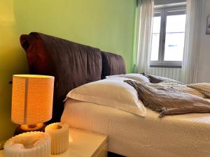 Ένα ή περισσότερα κρεβάτια σε δωμάτιο στο Casa di Chiara