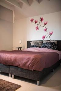 A bed or beds in a room at B&B A Dream City spa & Massages