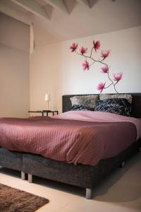 Postel nebo postele na pokoji v ubytování B&B A Dream City spa & Massages