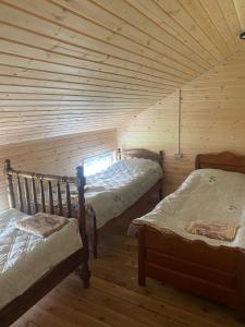 Postel nebo postele na pokoji v ubytování Guest house sofia