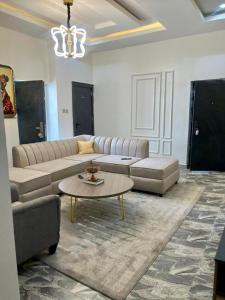 Posezení v ubytování Whitehouse apartment