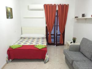 A bed or beds in a room at Estudio Las Huertas