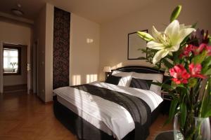 Posteľ alebo postele v izbe v ubytovaní Elysee Hotel