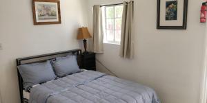 a bedroom with a bed and a window at Cozy & Private Room in Goleta in Santa Barbara