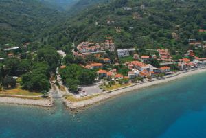 an aerial view of a town on the shore of the water at Zefiros in Agios Ioannis Pelio