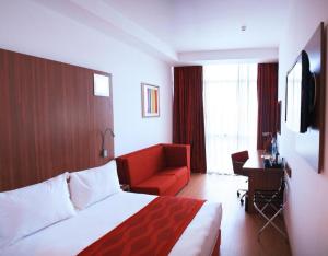 Katil atau katil-katil dalam bilik di Ramada Encore By Wyndham Tangier