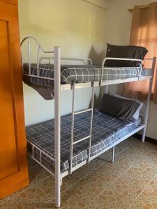 a couple of bunk beds in a room at Villa Palanca in Candelaria +5 photos