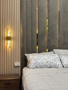 Postel nebo postele na pokoji v ubytování Casa Linnea - SMDC Cheer Residences