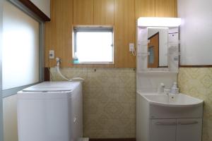 Koupelna v ubytování Value Residence Hotel 西之表 + 15 fotografií