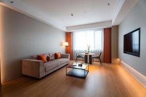 Area soggiorno di Ronghuitong SSAW Hotel