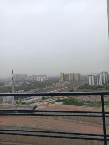 Nespecifikovaný výhled na destinaci Greater Noida nebo výhled na město při pohledu z apartmánu + 1 fotografie