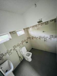 Koupelna v ubytování Dilrukshan Holiday Resort