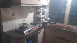 Η κουζίνα ή μικρή κουζίνα στο Don Bosco Home Stay