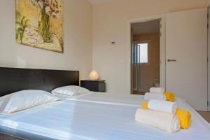 Postel nebo postele na pokoji v ubytování Residence Club El Paraiso