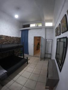 TV a/nebo společenská místnost v ubytování Casa León