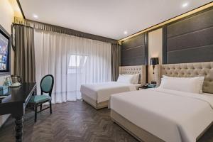 Кровать или кровати в номере Xana Lite Hotelle Tianjin Huaming Binhai International Airport +179 фотографий