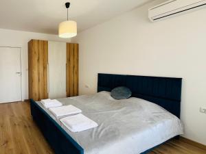 A bed or beds in a room at Sea View Rental Front Beach