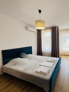 A bed or beds in a room at Sea View Rental Front Beach