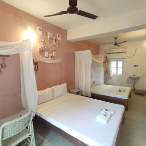 Postel nebo postele na pokoji v ubytování Vanam Pool Stay