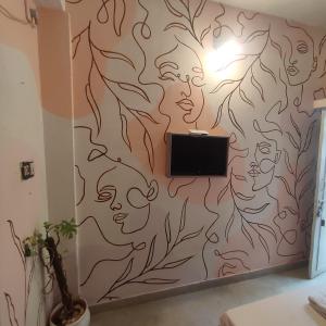 TV a/nebo společenská místnost v ubytování Vanam Pool Stay