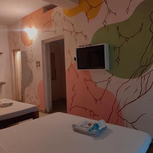 TV a/nebo společenská místnost v ubytování Vanam Pool Stay