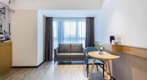 Khu vực ghế ngồi tại City Comfort Inn Nanning Puluowangsi