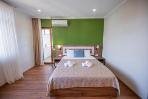 Letto o letti in una camera di The Fresh Wave hotel