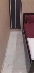 Rúm í herbergi á Shivay Guest House Near Ram Mandir