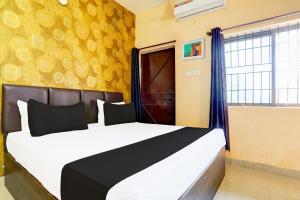 Postel nebo postele na pokoji v ubytování Hotel O Rewansh in + 23 fotografií