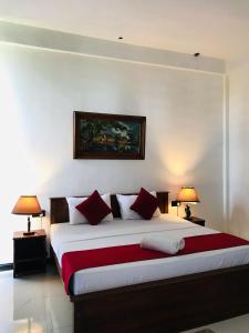 Letto o letti in una camera di Ciel Star Anuradhapura