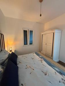 Ένα ή περισσότερα κρεβάτια σε δωμάτιο στο Casa Tonzi