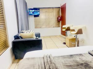 Χώρος καθιστικού στο Genza Guesthouse in Pretoria +42 φωτογραφίες