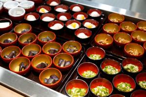 a bunch of cups of food on a tray at Dormy Inn Nagano in Nagano