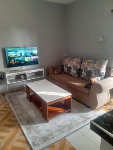 TV a/nebo společenská místnost v ubytování Kelly Homes